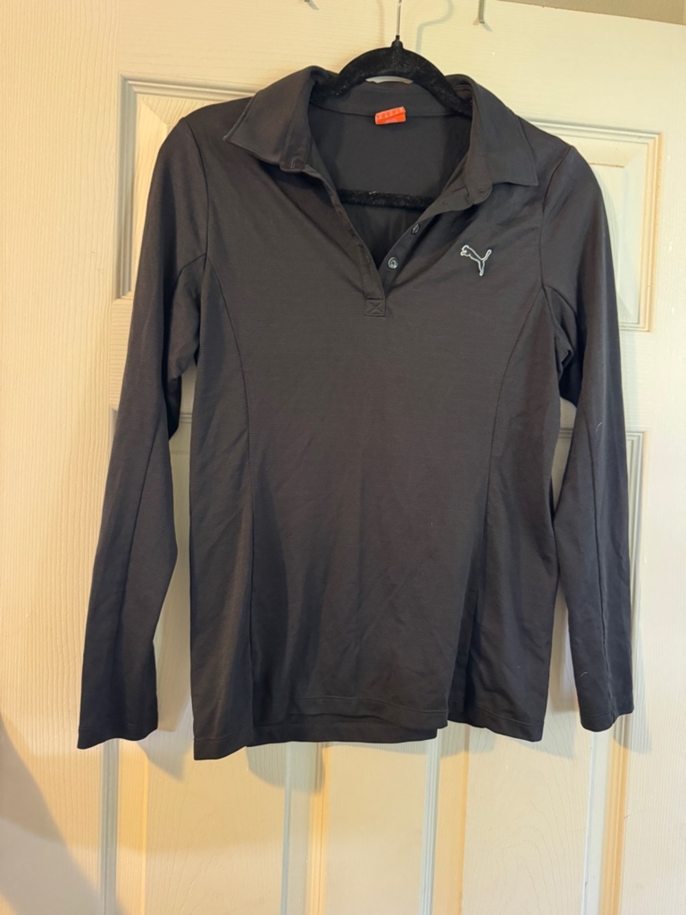 Like new women’s Puma Long Sleeve Polo Top black M